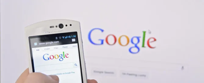 a smartphone and computer running google search.